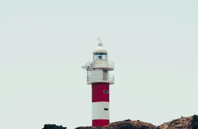 Group doing calisthenics exercises outdoors in Alcalá at sunset